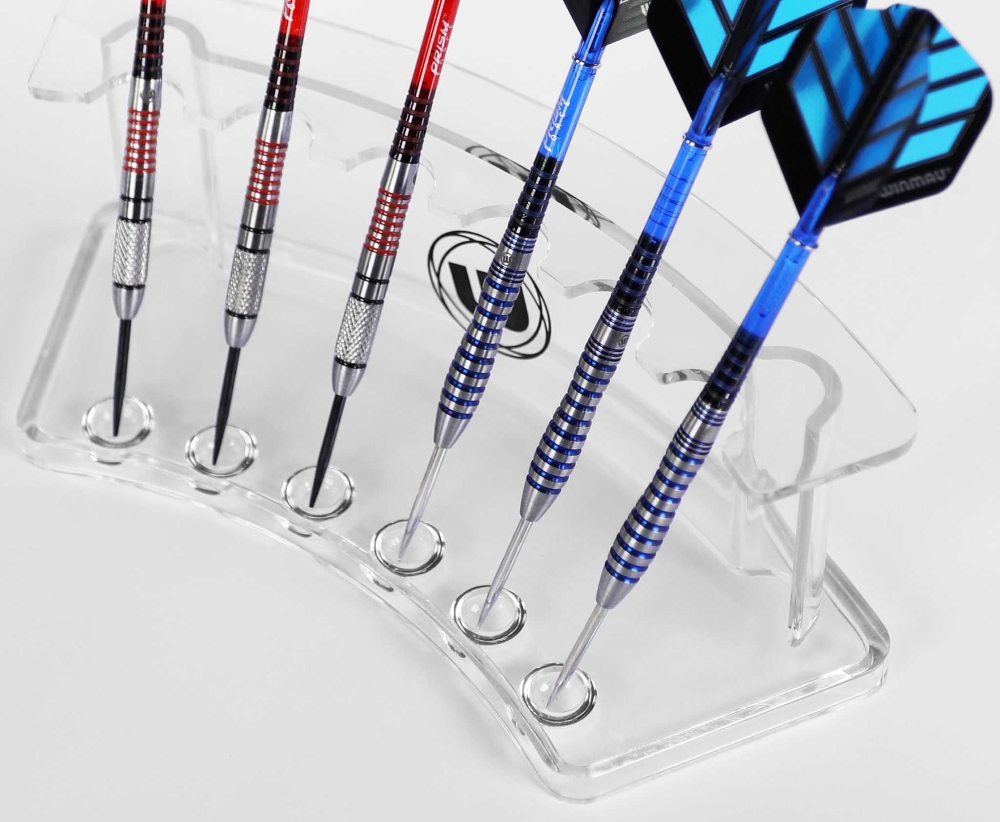 Winmau Wave Dart Display Stand holding six darts in a clear curved acrylic holder Winmau Wave Dart Display Stand holding six darts in a clear curved acrylic holder