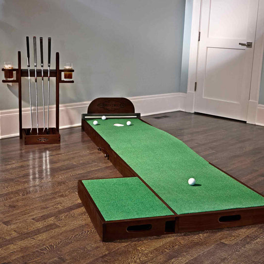 Ross Putting Green with espresso finish, 2x8 feet, adjustable incline, two break stations, cup, side step, and putter rack in indoor room