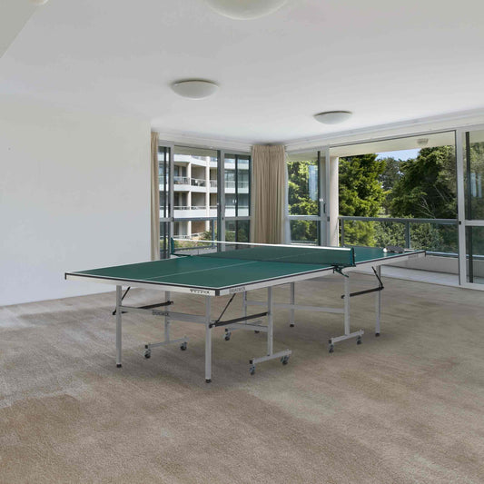 Smash 3.0 Table Tennis with green 16mm MDF playing surface, fold-up design, casters, and clip-on net set in spacious indoor room