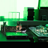 Close-up of electronic components on a green surface with a blurred along with the STAR WARS™ TIE Fighter 90% SP Darts Close-up of electronic components on a green surface with a blurred along with the STAR WARS™ TIE Fighter 90% SP Darts