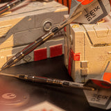 STAR WARS™ X-Wing 90% SP Darts two darts with 'X-Wing' labels on a Target 3d block background STAR WARS™ X-Wing 90% SP Darts two darts with 'X-Wing' labels on a Target 3d block background