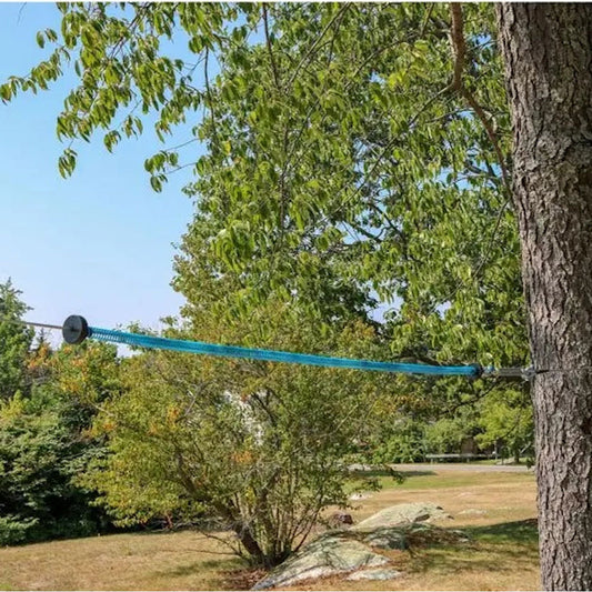 Slackers Zipline Spring Brake Kit shown attached to tree