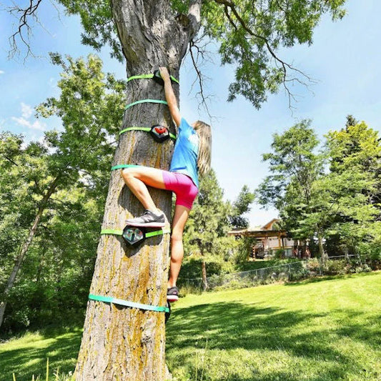 Slackers Tree Climbers Kit girl climbing tree withe climbers kit