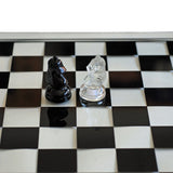 14" Black and Clear Glass Chess Set close up of pieces on board