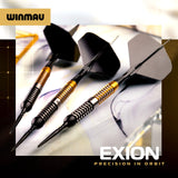 Winmau Exion darts with gold and black design on a reflective surface.