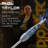 Phil Taylor with a dart labeled 'Raw Power GX2' in a promotional setting.