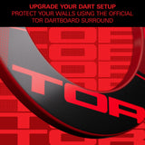 Promotional graphic for TOR dartboard surround, featuring bold red and black typography with a close-up of a curved black and red border. Text at the top reads: 'UPGRADE YOUR DART SETUP PROTECT YOUR WALLS USING THE OFFICIAL TOR DARTBOARD SURROUND'.