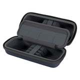 Black carrying case with open lid on a white background