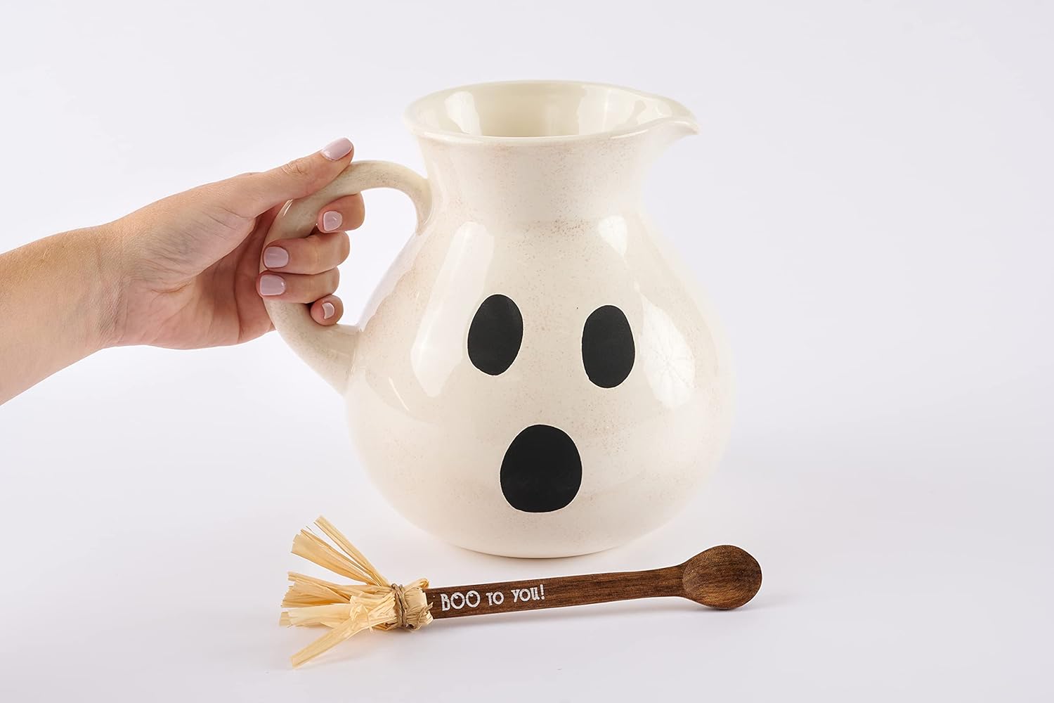 Mudpie 45500046 Ceramic Ghost Pitcher Set showing size portion to hand.