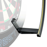 Close-up of Target Corona Vision 2 Light target arm and scoring board segment on a white background, with a faded dartboard face visible behind it.