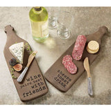 Mango wood bar board set with printed sayings, includes hammered metal handle spreaders, serving cheese, salami, crackers, and wine glasses