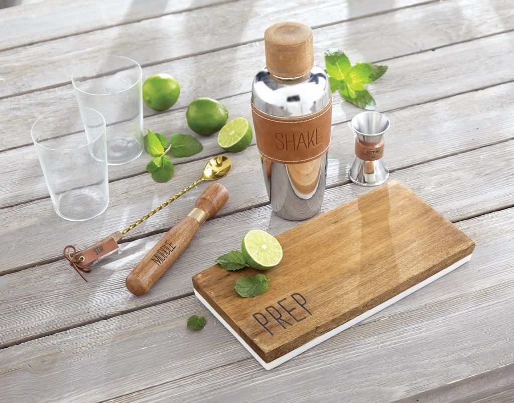 Prep & Serve Reversible Board wooden prep side with lime and bar tools on wooden surface