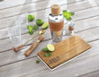 Prep & Serve Reversible Board wooden prep side with lime and bar tools on wooden surface