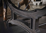 Close-up of the cast iron decorative pedestal base of the Birmingham Pool Table by Brunswick Billiards with vintage industrial design details