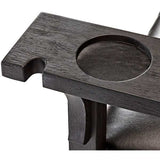 Close-up of Brunswick Centennial Player's Chair armrest with cue notch and cup holder in dark wood finish