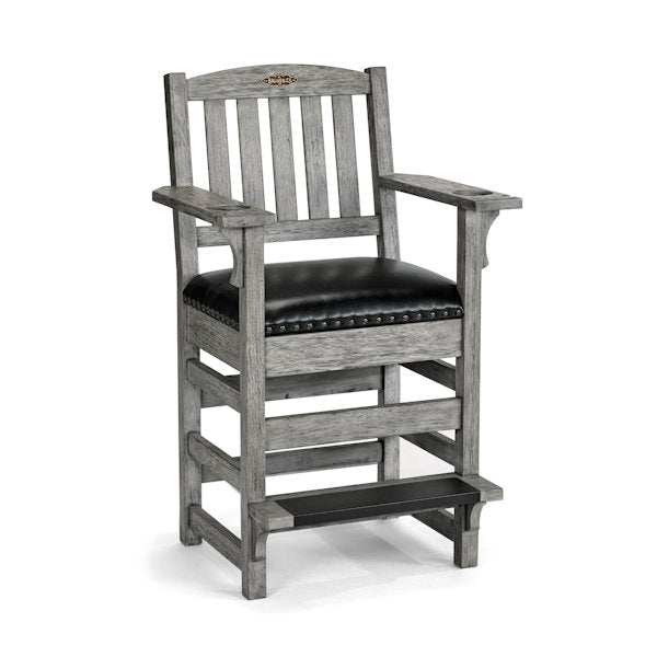 Brunswick Centennial Player's Chair with pin-nailed cushion, cue notches, cup holders, footrest, and hidden drawer in rustic grey finish