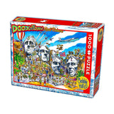 Jigsaw puzzle box featuring Mount Rushmore with colorful illustrations on a white background