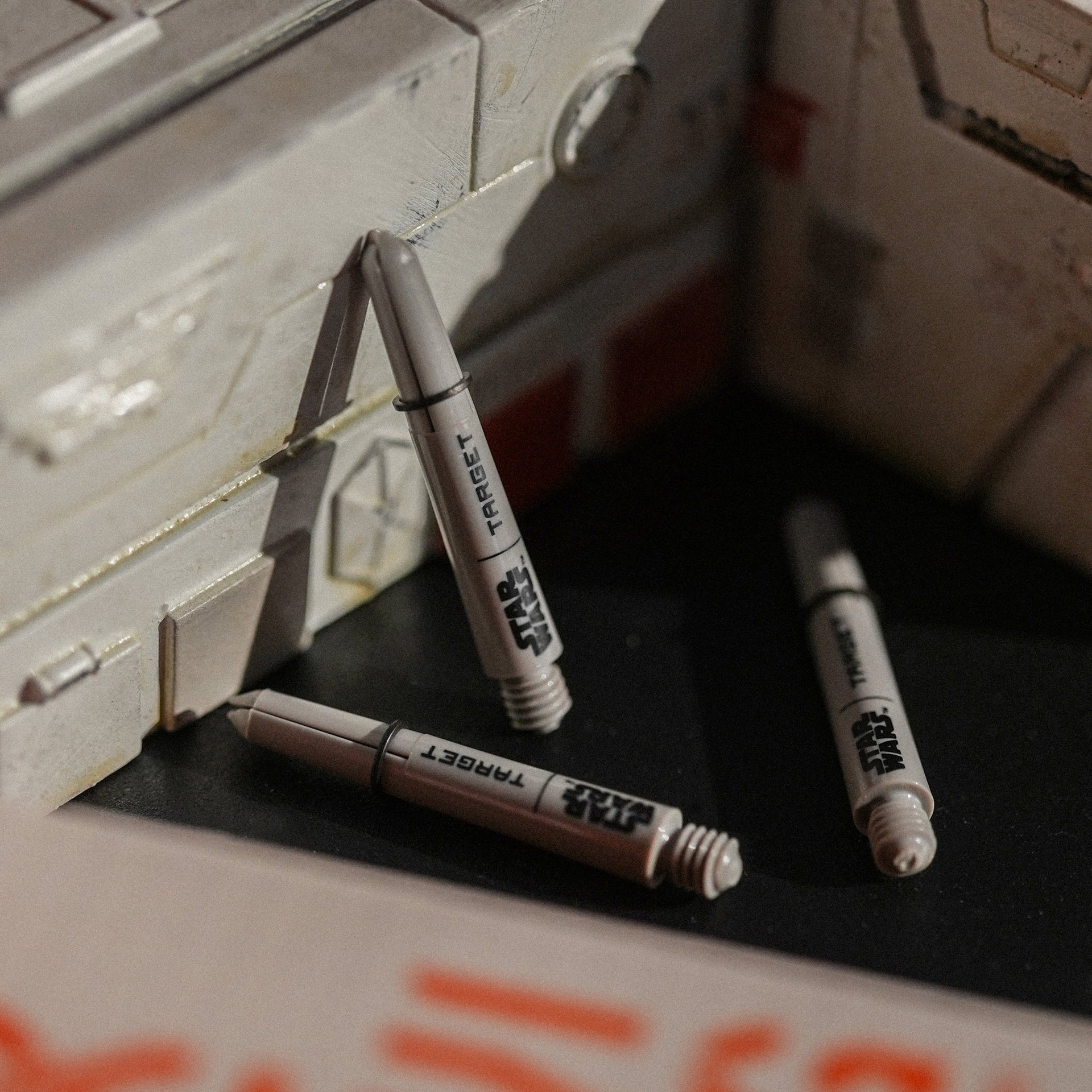 Model of a spaceship with 'Target' markers on a dark surface