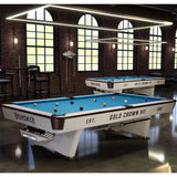 Brunswick Gold Crown VII pool table in a room with large windows and bar stools.