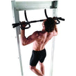Man using multi-function door gym for pull-ups mounted on door frame