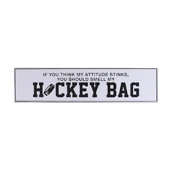 Metal hockey bag sign with "If you think my attitude stinks, you should smell my HOCKEY BAG" text