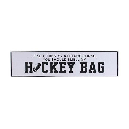 Metal hockey bag sign with "If you think my attitude stinks, you should smell my HOCKEY BAG" text