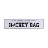 Metal hockey bag sign with "If you think my attitude stinks, you should smell my HOCKEY BAG" text