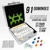Domino set with 91 pieces, aluminum carrying case, and train markers on a white background