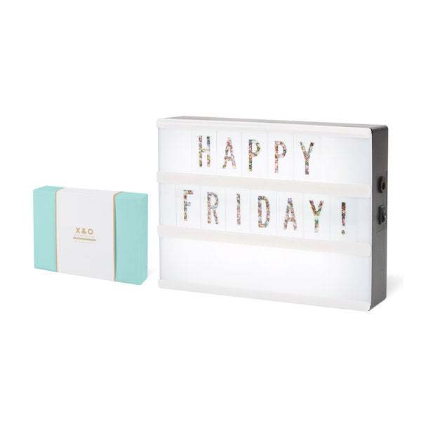 Marquee Sign - Glitter with multi-colored neon letters spelling Happy Friday and gift box on white background