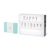 Marquee Sign - Glitter with multi-colored neon letters spelling Happy Friday and gift box on white background