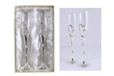 Double Hearts Toasting Flutes set with silver-dipped bases and interlocking heart designs for weddings