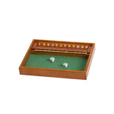 Shut The Box 12 wooden dice game with tiles numbered 1 to 12 and two dice on green felt surface
