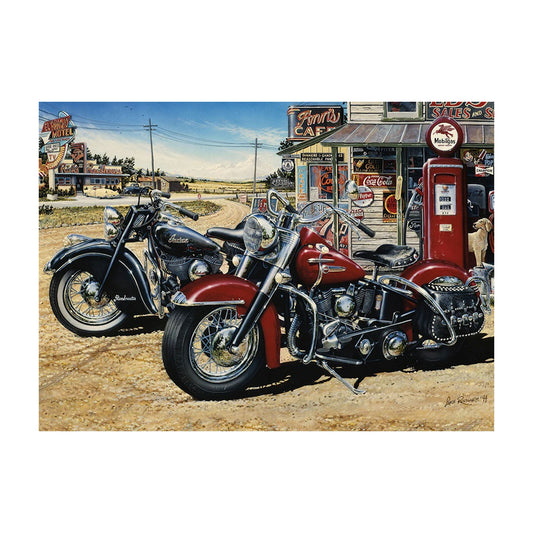 Two vintage motorcycles parked in front of a gas station with classic Americana elements.