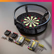 Omni Ultimate home bundle includes TOR dartboard, Omni Black Surround, Bolide darts, and K-Flex accessories on a gray surface